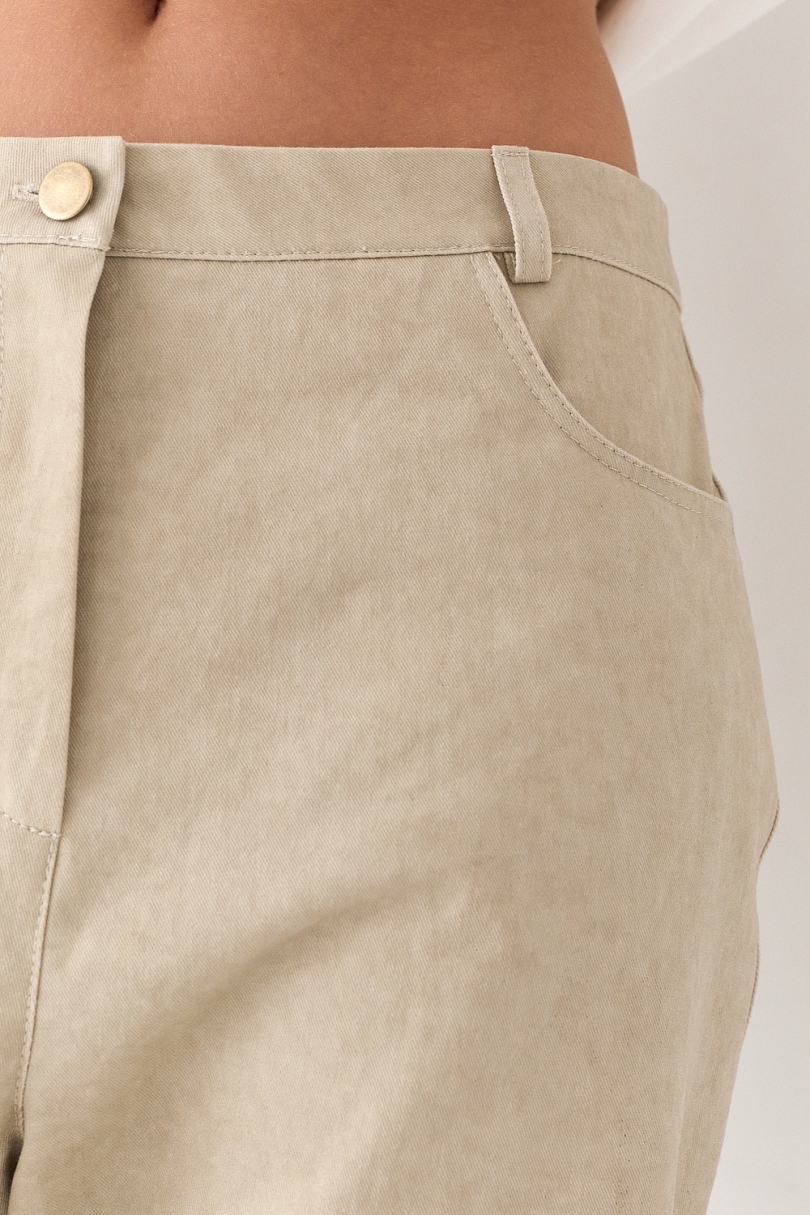 Джинсы из вареного денима